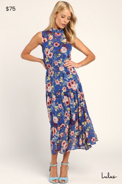 Create an ultra-dreamy silhouette in the Lulus In My Dreams Blue Floral Print Midi Dress! Lightweight woven chiffon, in a lovely blue, yellow, red, and hues of pink floral print, shapes a mock neck, sheer dÃ©colletage, and relaxed, sleeveless bodice. Elasticized waist tops a full, tiered midi skirt. Back keyhole with top buttons. Fit: This garment fits true to size. Length: Mid-calf length. Size medium measures 49.5" from shoulder to hem. Bust: Great for any cup size. Waist: Fitted - elastic wai Wedding Attire For Guest, Fam Photos, 2023 Wishlist, Blue Lace Midi Dress, Red Lace Midi Dress, Blue Floral Midi Dress, Spring Wedding Guest Dress, Tiered Midi Skirt, In My Dreams