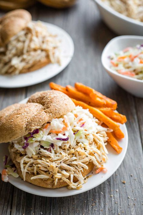 Only 5 ingredients and 5 minutes of prep – so EASY in your pressure cooker! Your family will love the tender, flavorful pulled chicken in our popular Carolina-Style Instant Pot BBQ Chicken Sandwiches! Pile it high on soft buns with a side of slaw – DELICIOUS! This recipe is a reader favorite – try it and you’ll see why! | Instant pot recipes easy | instant pot chicken recipes | pressure cooker recipes | pressure cooker chicken | chicken recipes | shredded chicken | www.TwoHealthyKitchens.com Chicken Recipes Pressure Cooker, Shredded Bbq Chicken Sandwiches, Easy Instant Pot Chicken Recipes, Chicken Recipes Shredded, Recipes Shredded Chicken, Easy Shredded Chicken Recipes, Amazing Chicken Breast Recipes, Instant Pot Bbq Chicken, Bbq Chicken Sandwiches