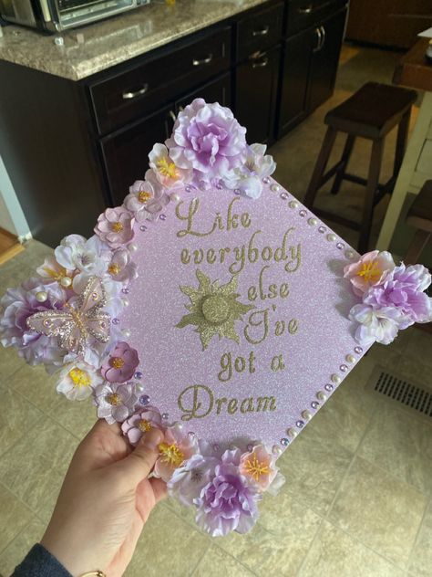 Cap Decoration Graduation Princess, Slipping Through My Fingers Grad Cap, College Hats Graduation Caps, Star Grad Cap Ideas, Repunzle Graduation Cap, Graduation Cap Designs Inspiration, Grad Caps With Bows, Grad Cap Ideas Business Major, Extra Graduation Cap