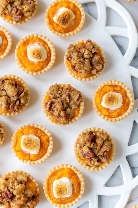 Mini Sweet Potato Casserole Bites | Pizzazzerie Mini Sweet Potato Desserts, Mini Sweet Potato Casserole Bites, Appetizer With Sweet Potatoes, Sweet Potato Tarts Mini, Sweet Potato Party Food, Mini Thanksgiving Food, Sweet Potato Casserole Cups, Sweet Potato Mini Pies, Mini Sweet Potato Pie Bites