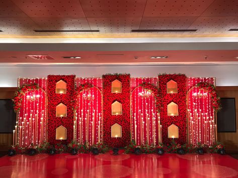 Red Wedding Stage Decor, Red Wedding Stage, Varmala Stage Decor, Wedding Stage Design Backdrop Ideas, Red Wedding Backdrop, Stacked Tile Backsplash, Indian Wedding Backdrop, Sangeet Backdrop, Stacked Tile