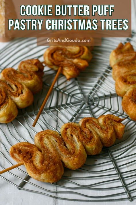 These Puff Pastry Christmas Trees filled with cookie butter are fun and festive holiday cookies on a stick! They only require 4 ingredients and simple prep. Perfect for cookie swaps, cookies for Santa, teacher gifts and are fun to make with kids. Puff Pastry Biscoff Christmas Trees, Puff Pastry Xmas Tree, Nutella Tree Puff Pastry, Nutella Puffed Pastry Christmas Tree, Cookie Butter Puff Pastry, Christmas Tree Desserts, Butter Puff Pastry, Holiday Sprinkles, Easy Puff Pastry