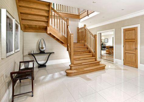 https://flic.kr/p/PiUPtY | Sunning Ave 2 | 2 bespoke solid oak 2x¼ turn staircases including oak strings, treads, landings, risers, newel posts, handrails and spindles. At the base of the main staircase there is a double bullnose on both sides and the installation also includes solid oak landings. The design of the main staircase narrows allowing the first bullnose to be almost 2 meters wide. When the bullnose treads are included with the angled strings, the width of the staircase was reduce... Center Staircase, Luxury Staircase, Bespoke Staircases, Timber Staircase, Handrail Design, House Staircase, Glass Stairs, Hall Interior Design, Entrance Interior