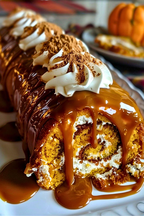 Indulge in the flavors of fall with this Pumpkin Caramel Spice Cake Roll! Filled with creamy caramel and topped with a sweet cinnamon glaze, it's the ultimate autumn treat. Spice Cake Roll, Caramel Spice Cake, Pumpkin Roll Cake, Cinnamon Glaze, Caramel Pumpkin, Pumpkin Pecan Pie, Creamy Caramel, Crowd Pleasing Appetizers, Pumpkin Roll