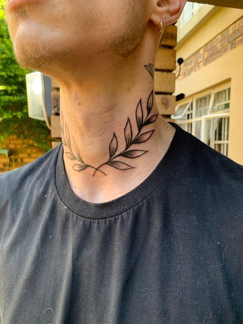 Olive branch Neck tattoo Leaf Throat Tattoo, Traditional Wreath Tattoo, Olive Leaf Tattoo Collar Bone, Leaves On Neck Tattoo, Laurel Wreath Neck Tattoo, Olive Branch Wreath Tattoo, Vines Neck Tattoo, Neck Leaves Tattoo, Branch Neck Tattoo