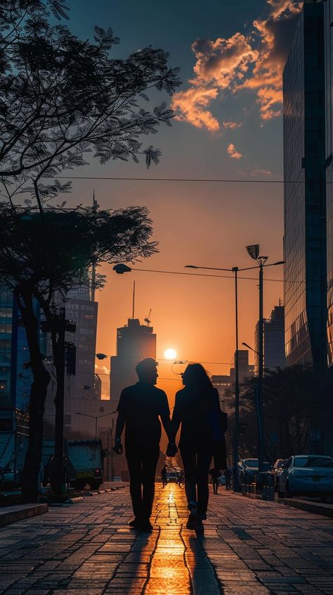 "Sunset City Walk: A couple walks hand in hand down a city sidewalk, silhouetted against the #sunset. #cityscape #couple #walking #silhouette #aiart #aiphoto #stockcake ⬇️ Download and 📝 Prompt 👉 https://stockcake.com/i/sunset-city-walk_531203_961860 #urbanlife #romanticwalk #eveningstroll #cityvibes #twilight #urbanromance #citysunset" Walking Silhouette, City Sidewalk, Sunset Cityscape, Couple Walking, Couple Silhouette, Couples Walking, The Setting Sun, Silhouette Photos, Sunset City