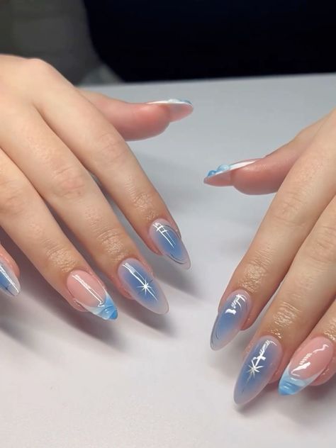 Chrome Nails French Tip Blue, Blue Aura Chrome Nails, Light Blue Prom Nails Almond, Dreamy Blue Nails, Aura Nails Stars, White And Blue Almond Nails, Blue Design Almond Nails, White And Blue Aura Nails, Blue Shine Nails