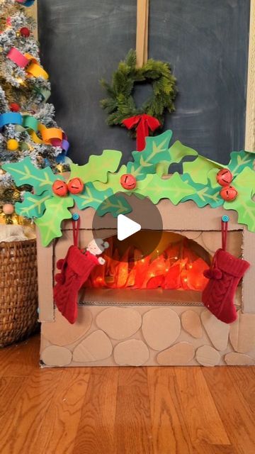 Studio Rosie on Instagram: "Cardboard Box Fireplace with Makedo 🎅

I used our @makedo tools to turn a cardboard box into a mantle, transforming our pizza oven into a cozy fireplace! The Makedo scrus are the perfect place to hang the stockings 😊 

I love this Christmas update for our pizza oven. Rosie and Mae really love playing Santa and filling the stocking with surprises!

Visit make.do/studiorosie10 (🔗 in bio) and use promo code STUDIOROSIE10 at checkout to get 10% off your order!

#mymakedo #recycleandplay #recyclemeplay #craftcreateandmake #easycrafts #invitationtocreate #invitationtoplay #funbudgetplay #kidcrafts #toddlerplayideas #cardboardcrafts #christmascrafts #diychristmas #christmasactivities #festiveplayalltheway" Cardboard Box Fireplace, Box Fireplace, Cardboard Construction, Cardboard Fireplace, Festive Crafts, Invitation To Play, Make Do, Holiday Break, Toddler Play