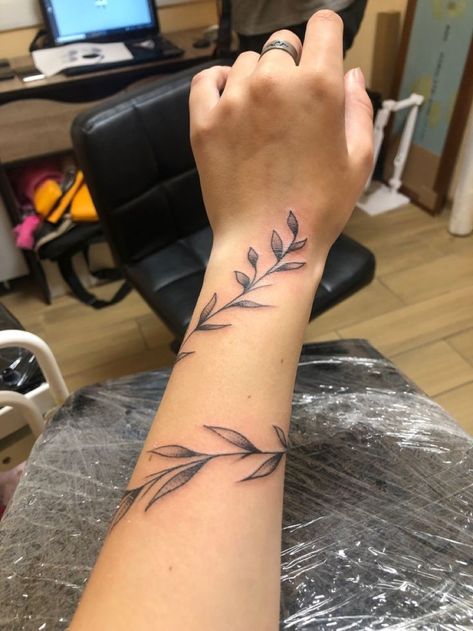 Leaf Wrap Around Tattoo Arm With Butterfly, Rap Around Vine Tattoo, Rap Around Vine Tattoo Arm, Fine Line Leaves Tattoo Arm, Barb Wire Forearm Tattoo, Dainty Vine Tattoo Arm, Thick Vine Tattoo, Vines Around Arm Tattoo, Arm Vine Tattoos For Women