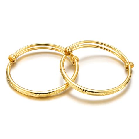 PRICES MAY VARY. Perfect Size and Design: These bangles have an Inner Diameter is from 4.5cm/1.77inches to 5cm/1.97inches, providing a comfortable fit for your little one. Flexible adjustable size design ensuring a secure and stylish suitable accessory. Premium Craftsmanship: Our bangles are expertly crafted with durable materials, featuring a highly polished 18K vacuum gold plating over copper. Adopting Color Preserving Electroplating Process，Lead-free and nickel-free .This combination ensures Silver Anklets Designs, Fish Designs, Electroplating Process, Baby Bangles, Anklet Designs, Adjustable Bangle Bracelet, Bracelets Design, Infant Boys, Baby Bracelet