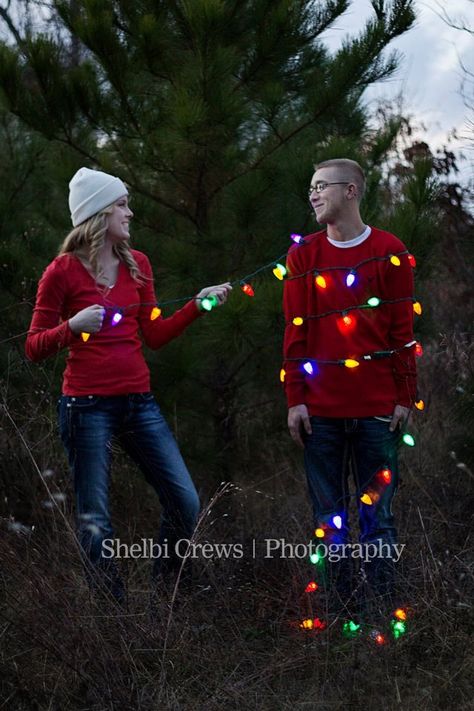 Christmas lights photo Xmas Couple Photos, Christmas Lights Photoshoot, Outdoor Christmas Photos, Christmas Light Photography, Christmas Engagement Photos, Funny Christmas Photos, Christmas Couple Photos, Christmas Couple Pictures, Couple Christmas Card