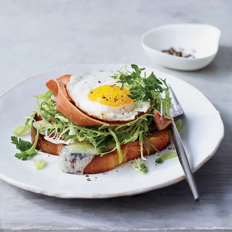 Brioche with Prosciutto, Gruyère and Egg | “I love a good frisée salad,” says Suzanne Goin. “And of course I love toasted, buttery bread, with big slabs of melted cheese and prosciutto and an egg on top.” Her sumptuous open-face sandwich, a staple at her A.O.C. wine bar since the place opened in Los Angeles in 2003, combines all her favorite things. Best Brunch Recipes, Brioche Recipe, Easter Brunch Food, Breakfast And Brunch, Egg Recipes For Breakfast, Egg Breakfast, Easter Brunch, An Egg, Breakfast Sandwich