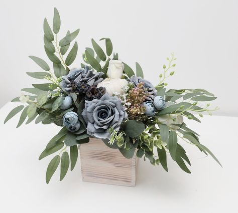 A&F Dusty Blue Green Wedding Table Arrangement,white Rose Wedding Decor , Floral Arrangement , Floral Centerpiece, Wedding Table Decoration - Etsy Dusty Blue Centerpieces Wedding Simple, Dusty Blue Wedding Table Settings, Dusty Blue Centerpieces, White Rose Wedding Decor, Dusty Blue Wedding Decorations, Rose Wedding Decor, Green Wedding Table, Wedding Decor Floral, Blue Flower Arrangements