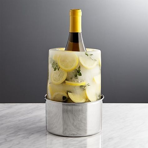 Bring a bottle to the perfect temp with this wine bucket mold that has lots of party potential. | 34 Ridiculously Clever Ways To Make Ice Chiller Refrigerator, Bandeja Bar, Citrus Slices, Wine Bucket, Different Wines, Unique Centerpieces, Ice Molds, Champagne Buckets, Beautiful Centerpieces