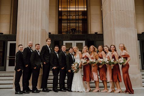 Burnt Orange Black Bridesmaid Dresses, Fall Wedding Groomsmen Attire Burnt Orange, Rustic Orange Bridesmaid Dresses With Groomsmen, Burnt Orange Wedding Party, Burgundy Bridesmaid Dresses Tan Suits, Copper Bridesmaids Dresses & Groomsmen, Rustic Orange Wedding Groomsmen, Black And Burnt Orange Wedding, Groomsmen Attire Black