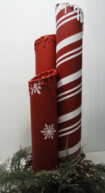 giant fake candles made from cardboard tubes and glue gun glue {burton avenue at craft gossip} Crafts With Cardboard Tubes, Plastic Tube Crafts, Cardboard Tubes Ideas, Cardboard Tube Crafts For Adults, Outdoor Christmas Candles, Pvc Christmas Decorations, Paper Tube Crafts, Diy Candle Pillars, Cardboard Tube Crafts