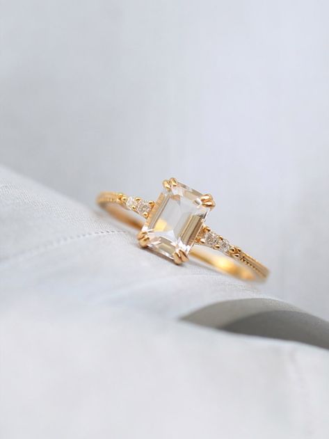 Elevate your jewelry game with our stunning Natural Clear Crystal Gemstone Ring, elegantly crafted with a shimmering gold plated band. Perfect for adding a touch of sophisticated charm to any outfit. Pretty Engagement Rings, Minimalist Wedding Decor, Green Themed Wedding, Sweet Ring, Cute Engagement Rings, Future Engagement Rings, Solid Gold Band, Emerald Engagement Ring Cut, Gold Gemstone Ring