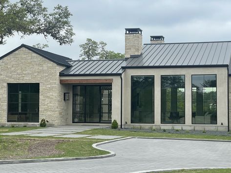 Single Story Farmhouse Exterior, Stone Houses With Metal Roofs, Modern Hill Country Exterior, Stone Houses Modern, Limestone Exterior House, Modern Shop House, Stucco House With Metal Roof, Stone Home With Metal Roof, Smooth Stucco Exterior House