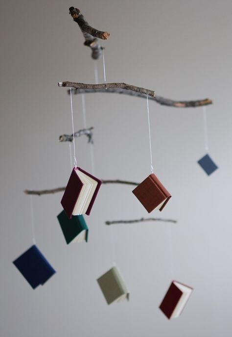 Book Of The Month Display, Hanging Books, Book Mobile, Baby Boy Book, Floating Books, Contemporary Books, Book Cafe, Mobile Art, Book Wall