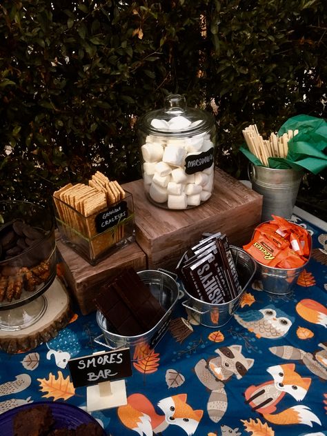 S'mores Bar for Woodland Themed Baby Shower! S’more Display, S’mores Themed Gender Reveal, Smores Baby Shower Theme, Smores Gender Reveal, S’more Love Baby Shower Ideas, S’mores Baby Shower Theme, Bonfire Baby Shower Ideas, S'more Baby Shower Theme, S’mores Baby Shower Decorations