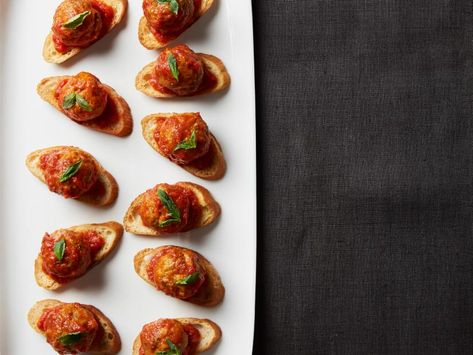 Mini Meatball Crostini Recipe | Food Network Meatball Crostini, Desserts Party Ideas, Desserts Party, Tiny Bites, Crostini Recipe, Food Bites, Hors Doeuvres, Crostini Appetizers, Mini Meatballs