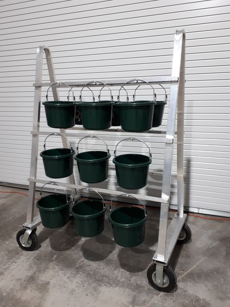 18 bucket Feed Cart made of aluminum. Will never rust. Saves time when feeding a large number of horses! Feed Buckets Horses, Horse Feeding Buckets, Feeding Room Horse, Horse Feed Bucket, Feed Room Ideas Barn, Horse Stall Ideas, Horse Feed Storage, Horse Feed Room, Show Cattle Barn