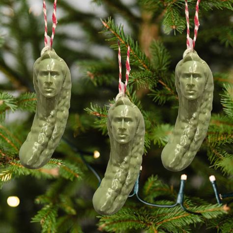 PRICES MAY VARY. 3D Decorative Hanging Ornaments: This Xmas green pickle ornament is carefully crafted to ensure durability and longevity. Made from high-quality materials, it's designed to withstand years of holiday festivities. Quirky Design: The Xmas green pickle ornament features an amusing fusion of Nicolas Cage's iconic face and a festive pickle, creating a whimsical and unforgettable decoration that will stand out on any tree. Unique Holiday Humor: Add a dash of hilarity to your Christmas Picolas Cage, Weird Ornaments, Pickle Ornament, Christmas Pickle, Trap House, Christmas Tradition, Nicolas Cage, Holiday Humor, Quirky Design