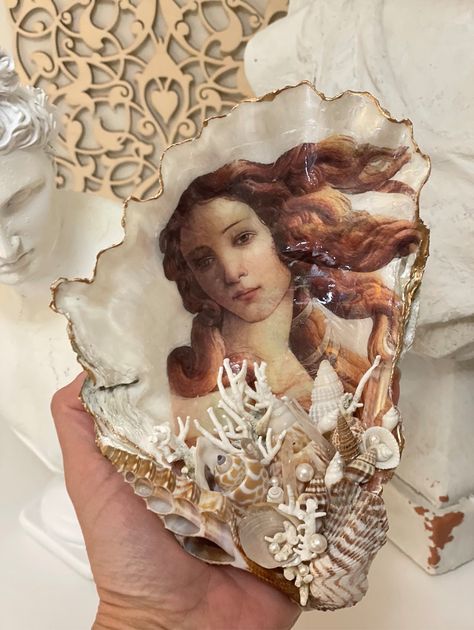 Extra Large piece of Oyster Shell decoupaged with portrait of Venus from famous painting "Birth of Venus" by Sandro Botticelli. Large Oyster shell - 8' x 5' was decoupaged and decorated with many little shells, corals, pieces of crystals and small pearls. Transfer is covered with glossy resin. The edges are finished with real gold liquid paint. Venus Portrait, Venus Artwork, Birth Of Venus Art, Greek Goddess Costume Diy, Goddess Costume Diy, Gift For A Friend Birthday, Vintage Shell Art, Shell Home Decor, Venus Art