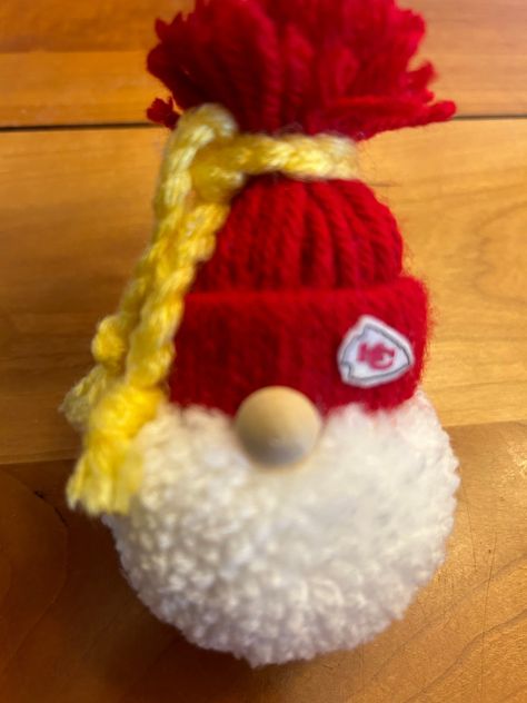 Kansas City Chiefs  ornament gnome ornaments. The stocking hat is red with a Kansas City emblem on the hat and a yellow, braided tie, Approximately 4 to 5 inches tall. Kc Chiefs Crafts, Homemade Gnomes, Chiefs Decor, Chiefs Christmas, Chiefs Crafts, Football Decor, Macrame Christmas, Kansas City Football, Football Decorations