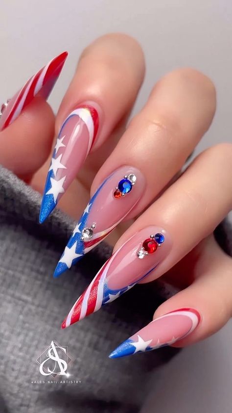 @ales.nail.artistry giving us this beautiful nail art that’s as dazzling as fireworks! ✨💅 #nailpro #redwhiteandblue #nailreels #fourthofjuly #nailinspo #trendynails #dailycharme | Nailpro | ianasher · Original audio Usa Inspired Nails, Simple 4th Of July Nail Art, Usa Nail Art, American Nail Designs, America Nails Designs, 4th Of July Nails Stiletto, 4th Of July Nail Designs Fireworks, Bling 4th Of July Nails, Fireworks Nails