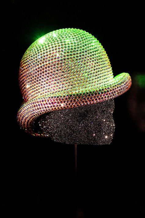 GRACE JONES. White satin bowler hat with Swarovski Crystals in Aurora Borealis (2009). Discover "The Art of Performance" at Swarovski Crystal Worlds, Austria. Exhibition | Museum | Travel Guide | Kristallwelten | Swarovski Crystals | Michael Schmidt | Derek McLane Exhibition Museum, Michael Schmidt, Met Ball, Grace Jones, Ruby Slippers, Bowler Hat, White Satin, Schmidt, Aurora Borealis