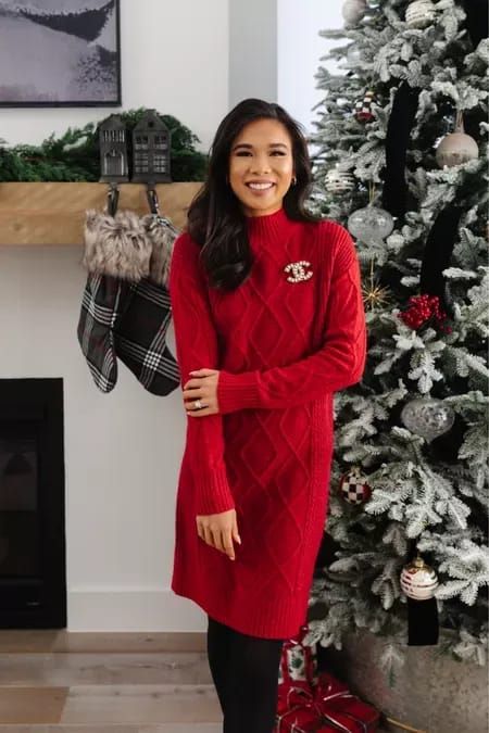 Holiday outfit with a red cable sweater dress and it’s 40% off with code MERRY. Wearing size XXS and it fits true to size. Also comes in gray! Also linking my Chanel brooch and Christmas decor including tartan stockings, stocking holders, similar garland and tree ornaments! #LTKsalealert #LTKHoliday #LTKhome Red Sweater Dress Outfit Christmas, Red Sweater Dress Outfit Winter, Red Sweater Dress Outfit, Sweater Dress Outfit Winter, Dresses With Black Tights, Cable Sweater Dress, Trendy Christmas Outfits, Chanel Brooch, Red Sweater Dress