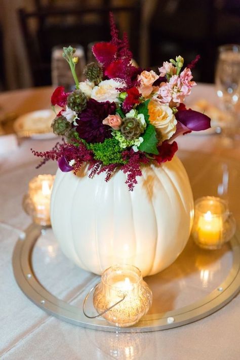 Turn heads with the stunning contrast made between a stark white pumpkin and a fall-inspired flower arrangement that features bold pops of color at your wedding. White Pumpkins Wedding, Pumpkin Centerpieces Wedding, Pumpkin Wedding, Fall Wedding Centerpieces, Pumpkin Centerpieces, Fall Wedding Flowers, Fall Wedding Decorations, Fall Centerpiece, October Wedding