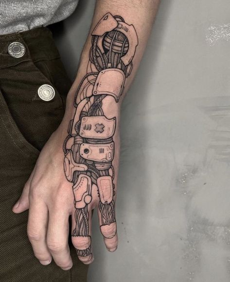 Badass tattoos in this article: you can find the true meaning of these inks, special features, and a collection of fascinating designs. Don’t delay and start reading! Cybernetic Hand Tattoo, Cyberpunk Hand Tattoo, Robot Hand Tattoo, Robotic Tattoo, Hanna Tattoo, Biomech Tattoo, Robot Tattoo, Tech Tattoo, Cyberpunk Tattoo