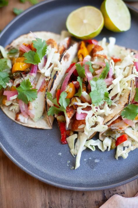 Give these easy air fried fish tacos a chance, and they just might make it onto your weekly rotation. They're seriously so good and so easy! Impress guests, feed the fam, or whip them up for a dreamy lunch... you really can't go wrong. Find the recipe at www.lillieeatsandtells.com Protein Taco Bowl, High Protein Taco Bowl, Air Fryer Lunch Ideas, Quick Air Fryer Dinner, Healthy Dinner High Protein, Mexican Food Dinner, Taco Night Ideas, Healthy Dinner Easy Recipes, Macro Friendly Dinner Recipes