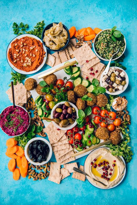 Vegetarian Mezze Platter Appetizer with Hummus, Falafel, Pita Bread, Lavash, Muhamara Dip, Olives and More! #Recipe #Appetizer #Mezze Peanut Butter Charcuterie Board, Butter Charcuterie Board, Vegetarian Mezze, Butter Board Charcuterie, Charcuterie Thanksgiving, Falafel Platter, Hummus Falafel, Meze Platter, Mezze Platter