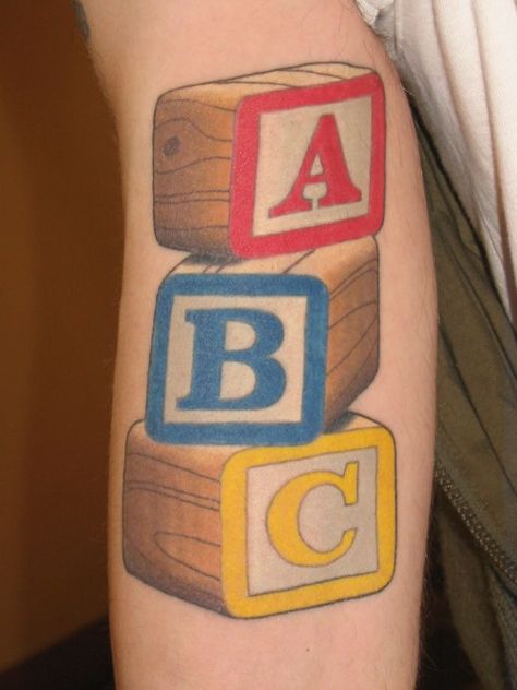 Thomas Graham, Super Genius Tattoo, Seattle WA, color tattoo, children's blocks, toys Tattoo Name Ideas, Kid Name Tattoo, Baby Name Tattoos, Tattoos Infinity, Tattoos With Kids Names, Tattoo Name, Wild Tattoo, Tiny Tattoo, Name Tattoo Designs