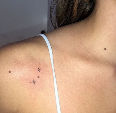 Done by @theghostkat. #tinytattoos #sparklestattoo #startattoos #thinlinetattoo Random Aesthetic Tattoos, Small Parisian Tattoos, Star Related Tattoos, Sparkle Stick And Poke, Small Sparkle Tattoo Ideas, Sparkles Tattoo Ideas, Feminine Dainty Tattoos, Tiny Sparkle Tattoo, Two Lines Tattoo