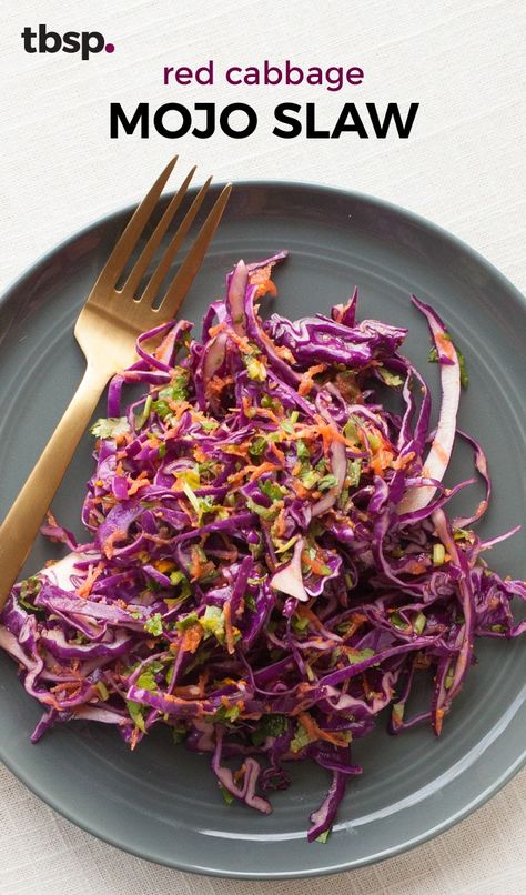 Cuban Mojo sauce is made with tons of garlic, fresh orange juice, and lots of oregano and cumin. Here, we use it as a dressing for a zesty, spicy red cabbage slaw that’s perfect for serving as a side dish or as a topping for barbecue sandwiches. Cuban Mojo Sauce, Purple Cabbage Slaw, Mojo Sauce, Cabbage Slaw Recipes, Cuban Mojo, Mexican Favorites, Red Cabbage Slaw, Fresh Orange Juice, Cuban Cuisine