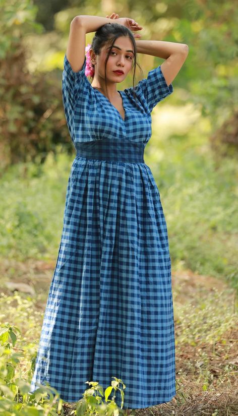 There are checks on the long frock suit design. Each of the four dresses has a unique colour and sleeve and neck pattern. Cotton Long Frocks For Women, Long Frock Suit, Cotton Long Frocks, Frock Suit Design, Long Frocks For Women, Frock Suit, Long Frock Designs, Long Frock, Frock For Women