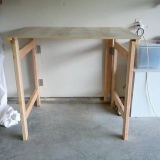 Make a Cheap Fold-down Workbench : 4 Steps (with Pictures) - Instructables Hobby Workbench, Fold Down Work Bench, Garage Workbench Ideas, Diy Bed Frame Plans, Workbench Ideas, Diy Table Legs, Garage Solutions, Bed Frame Plans, Fold Out Table