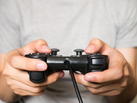 A young man holding game controller playing video games. , #Aff, #holding, #game, #young, #man, #video #ad Holding Controller Pose, Person Playing Video Games Reference, Hand Holding Controller Reference, Holding Gaming Controller Reference, Controller Reference, Controller Drawing, Gamer Logo, Human Pose, Hand References