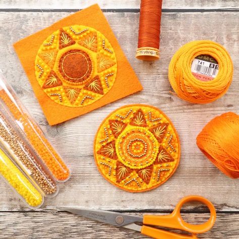 Chloe on Instagram: "You may have seen in my stories that I was seized by the desire to make some sun decorations earlier this week, I’ve not made these for a little while and always enjoy them, I was inspired by the hot sunny weather we’ve had in the UK recently 🌞  #felt #feltapplique #feltembroidery #feltcollage #feltartist #ilovefelt #folkartindpired #handmade #craft #spring #springdecor #summer #summerdecor #sun #sundecoration #celestial #celestialdecor #inspiredbynature" Felt Applique Ideas, Sun Decorations, Christmas Felt Decorations, Solstice Tree, Felt Sun, Sun Ornament, Craft Spring, Sky Quilt, Embroidery Ornaments