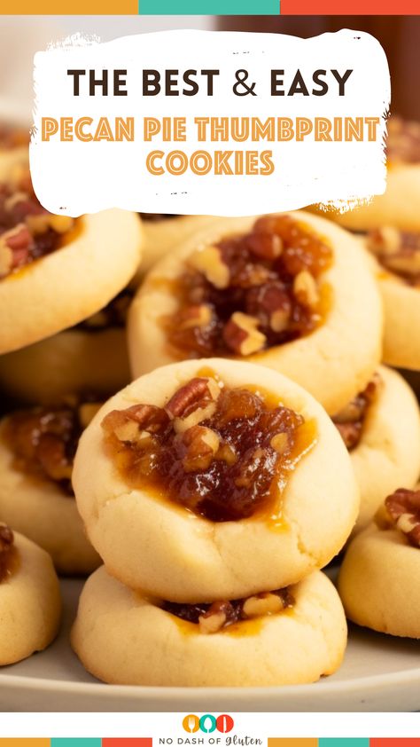 Discover the joy of baking with these Pecan Pie Thumbprint Cookies! A delightful combination of soft, buttery cookie dough and a luscious pecan pie filling, these cookies are sure to be a hit at any gathering. Perfect for holidays, family events, or just a cozy night in. Easy to make and irresistibly delicious, they bring the essence of pecan pie to your cookie jar. Don't miss out on this sweet adventure – grab the recipe now and start baking your new favorite treat! Pecan Pie Thumbprint Cookies Recipe, Homemade Thumbprint Cookies, Pecan Pie Thumbprint Cookies, Pecan Pie Cookies Easy, Oatmeal Thumbprint Cookies, Memorial Cookies, Pecan Thumbprint Cookies, Christmas Thumbprint Cookies, Thumbprint Cookies Easy