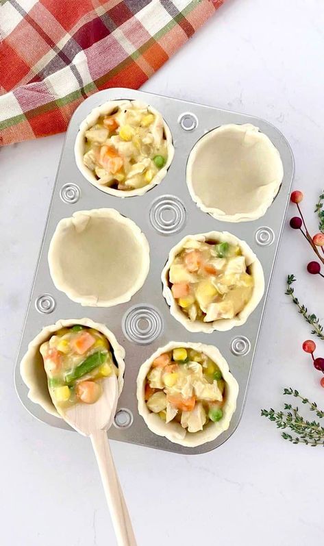 If you are looking for a delicious, warm and comforting meal to satisfy your craving for Thanksgiving time flavors, you will absolutely love these filling these Mini Turkey Pot Pies! This recipe is incredibly easy and inexpensive to make so it is surely going to become a staple in your household. This yummy pot pie recipe will be a huge hit in your home that the entire family is sure to love! Homemade Turkey Pot Pie, Homemade Care Package, Mini Turkey Pot Pies, Turkey Pot Pies, Turkey Pot Pie Recipe, Mini Pot Pies, Vegetable Pie, Turkey Pot, Pot Pie Recipe