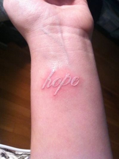 white ink...hope. Love Life Tattoo, Just Breathe Tattoo, White Ink Tattoos, Love Wrist Tattoo, Flower Tattoo On Ribs, Hope Tattoo, Meaningful Wrist Tattoos, Think Tattoo, Tattoos For Men And Women