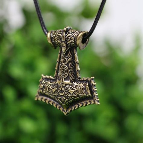 Wear Viking God's Thor protection with this amazing Leather Viking Hammer Necklace !         The Thor's Hammer Leather Necklace comes with a braided leather necklace, with an adjustable clasp Crafted from stainless steel, and with a unique Thor's Hammer charm which has been antiqued for a vintage style! Viking Hammer, Mjolnir Hammer, Hammer Necklace, Thor's Hammer Necklace, Braided Leather Necklace, Norse Myth, Hammered Necklace, Norse Jewelry, Thor's Hammer