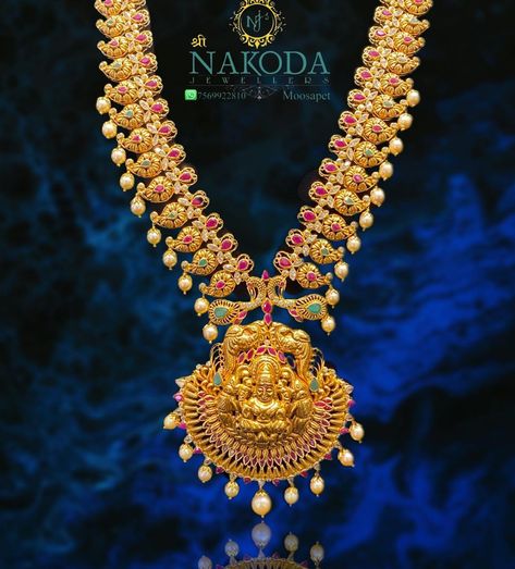 Nakoda Jewellers Moosapet on Instagram: “Mango Haram with Lakshmi Pendant! Follow us for more Trending Collection: @nakodajewellery . Contact us at: +91-7569922810 . Visit us at:…” Nakoda Jewellers, Lakshmi Pendant, Mango Haram, Bridal Fashion Jewelry, Bridal Fashion, Follow Us, Contact Us, Diamond Necklace, Statement Necklace