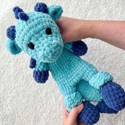 Attaching the Crochet Dragons Snuggler's tail as you go - Snuggler Pattern, Crochet Snuggler, Crochet Nursery, Crochet Lion, Lovey Pattern, Crochet Lovey, Crochet Dinosaur, Bernat Blanket Yarn, Crochet Dragon