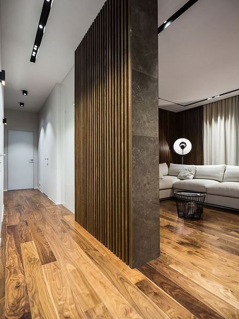 Home Tour: A chic, ultra-sleek 861sqf apartment designed with white and wood tones - Home & Decor Singapore Tinted Mirror Wall, Mirror Feature Wall, Mirror Decor Living Room, Feature Wall Design, Feature Wall Living Room, Mirror Dining Room, Tinted Mirror, Mirror Wall Living Room, Wall Decor Design